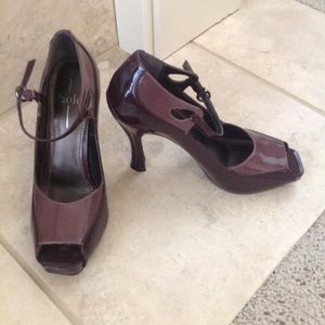 Linea Paolo women's patent peep toe heels.